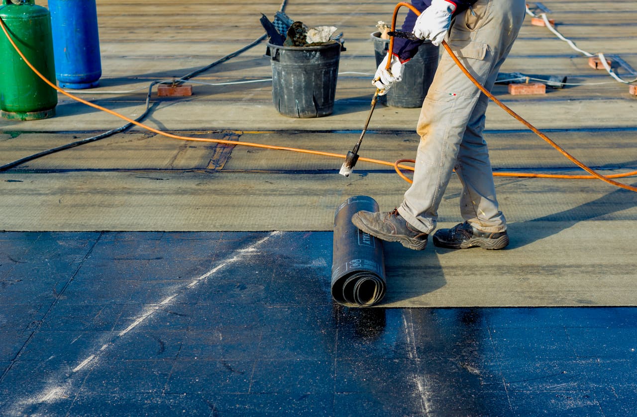Torch-on felt flat roof being finished in Berkshire